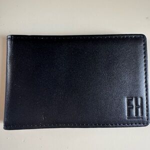 Compact Black Wallet with Leather Finish and Rectangular Design